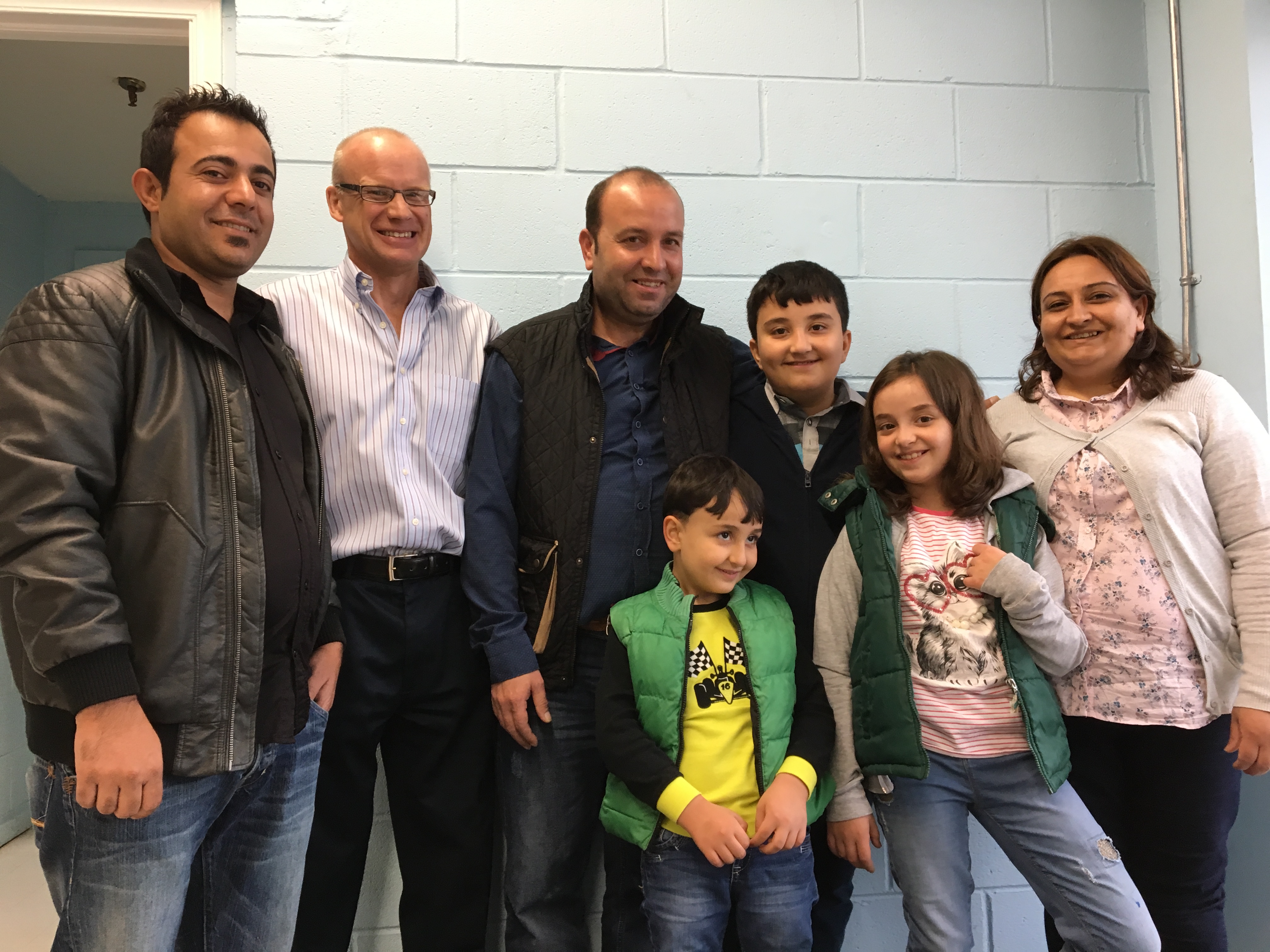 From left: Interpreter John Jowin, David Hobson, Halil Dudu, his children Muhammed, 7; Azad, 11; and Simaf, 9; and his wife Emine