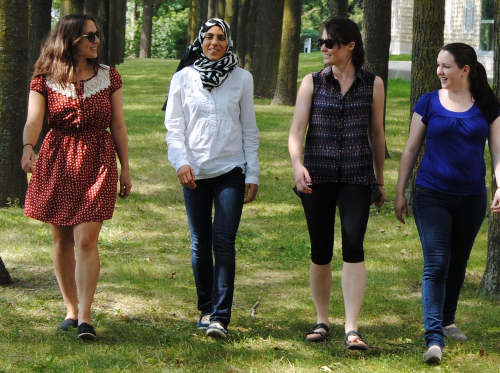 Women Walking by Summerlee Science Complex