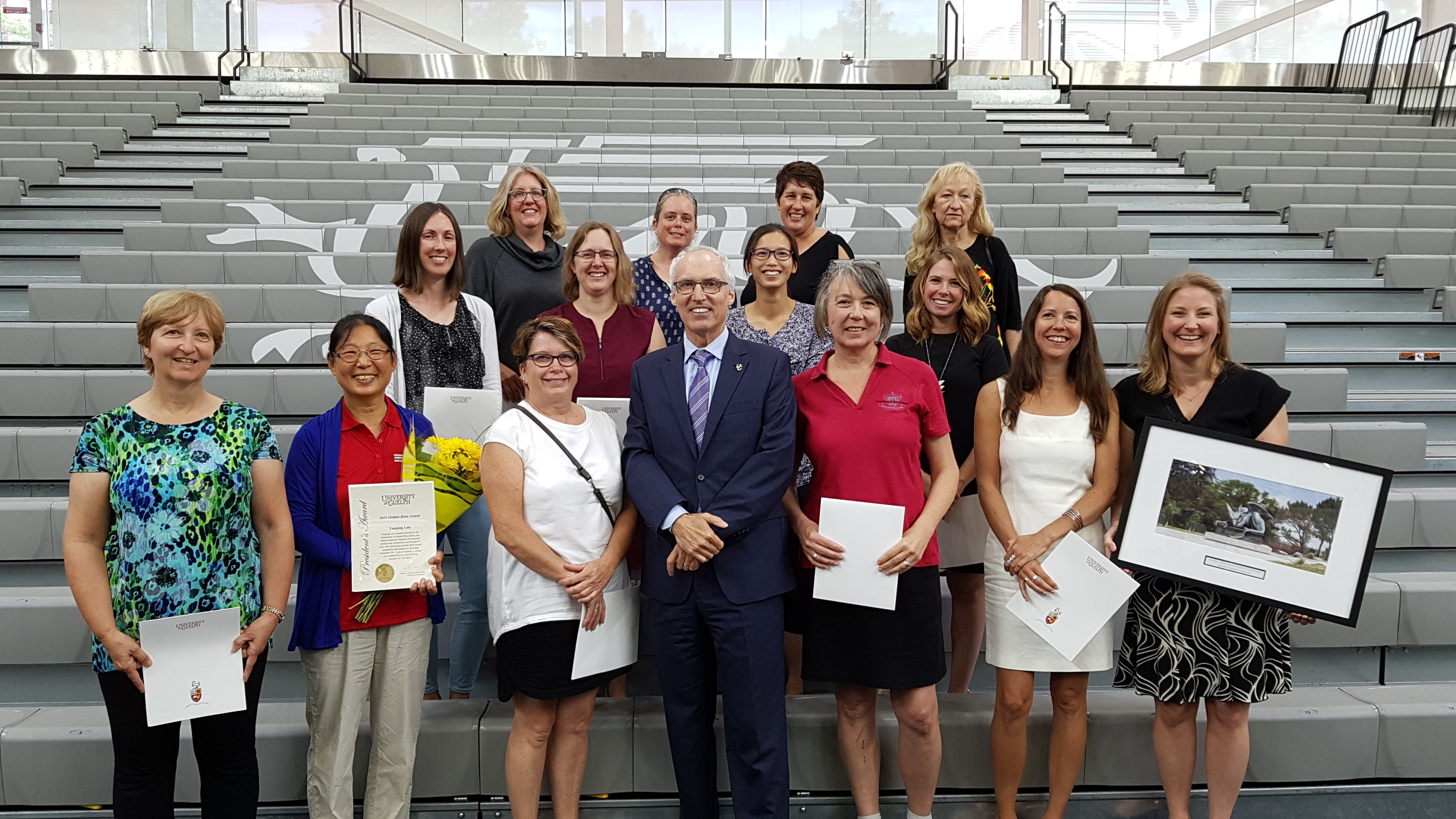 Winners of the 2018 Exemplary Staff Awards with President Vaccarino