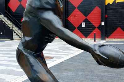 ‘The Hand-Off’: New Sculpture Installed at Alumni Stadium
