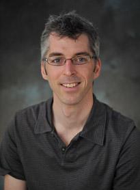 headshot of Prof. Andrew McAdam