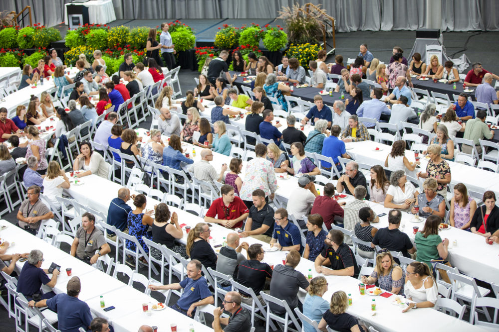 Guests eating at community event