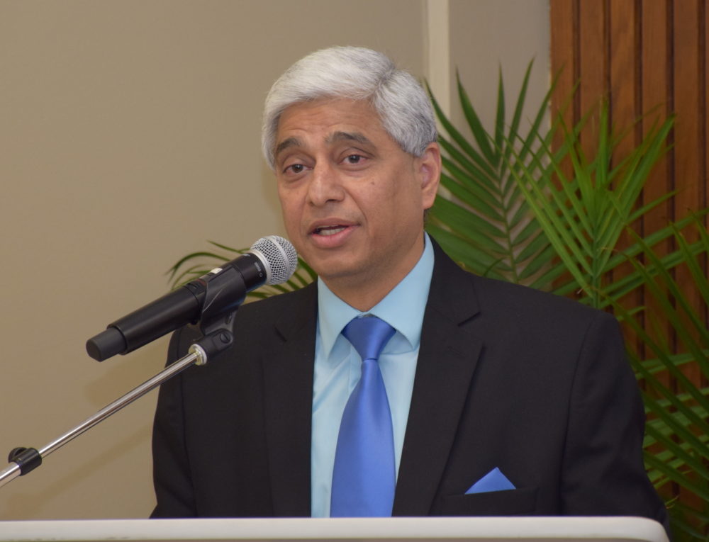 Man stands at a podium