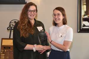 Emily Jones accepts the Library's award