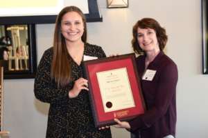 Megan Farkas receives her award
