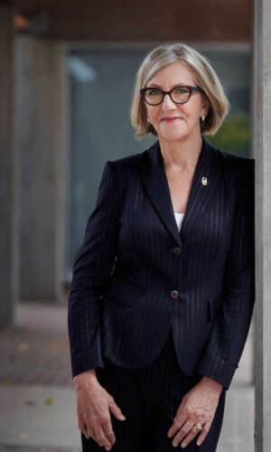 University of Guelph president Charlotte Yates in campus hallway