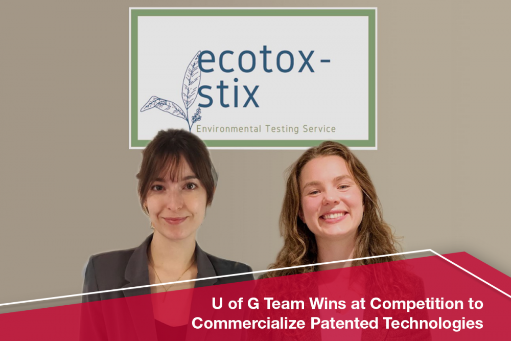 Rebecca Bradley and Brooke Rathie stand before a wall sign that reads Ecotox-Stix