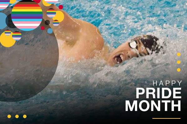 A closeup of a swimmer wearing goggles and a swim cap