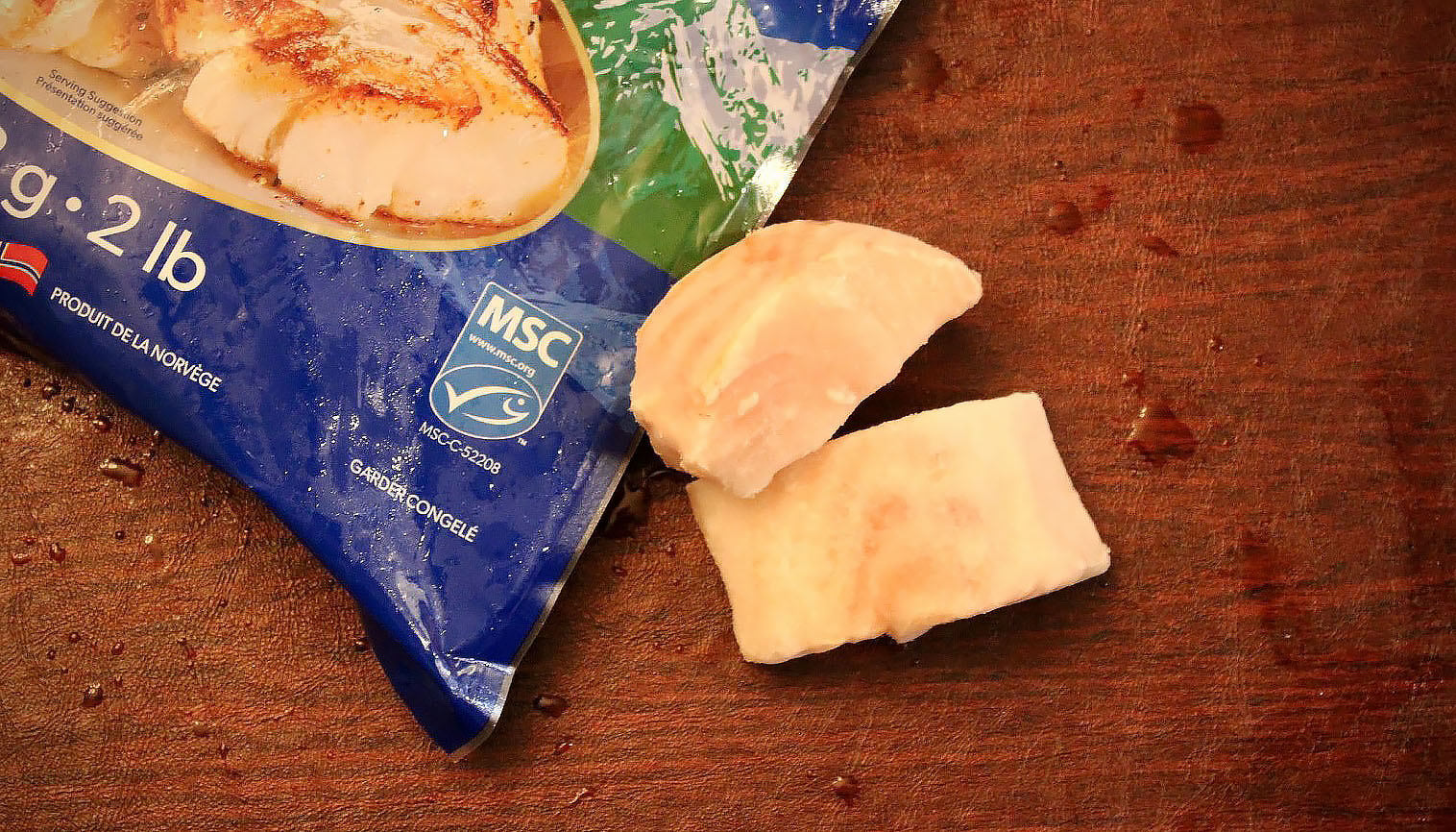 A package of frozen fish with the MSC label sits on a table