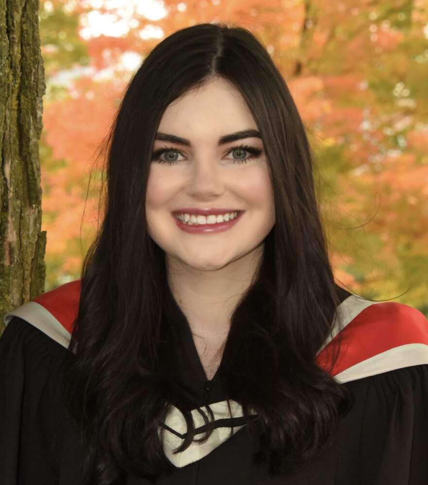 woman outdoors in U of G convocation regalia