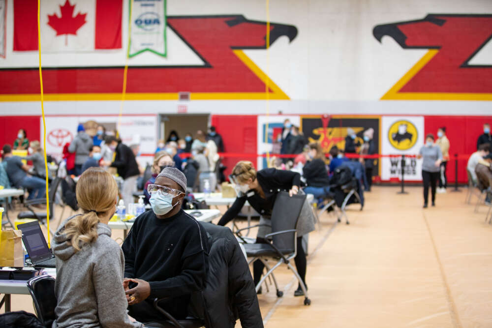 a wide angle view of the vaccination clinic at the U of G athletic centre