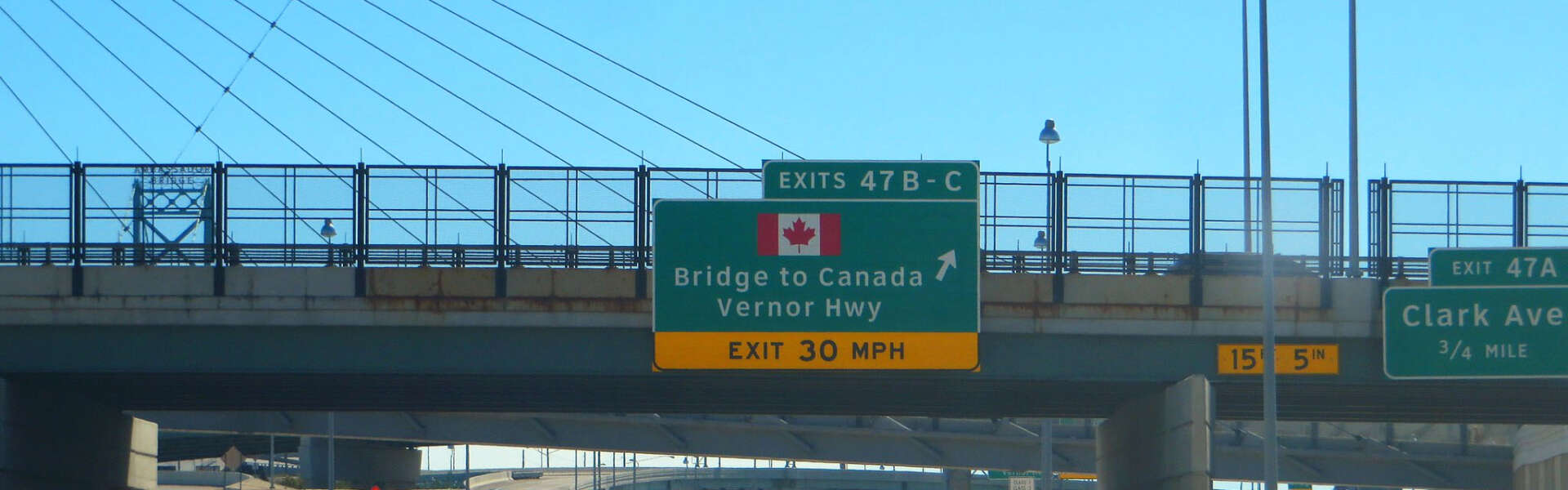 Signs for the Ambassador Bridge