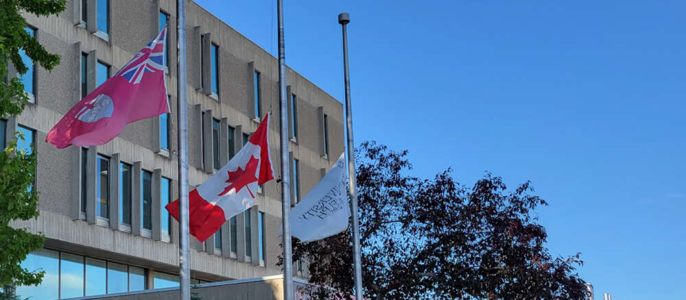 University Centre flags at half mast in summer