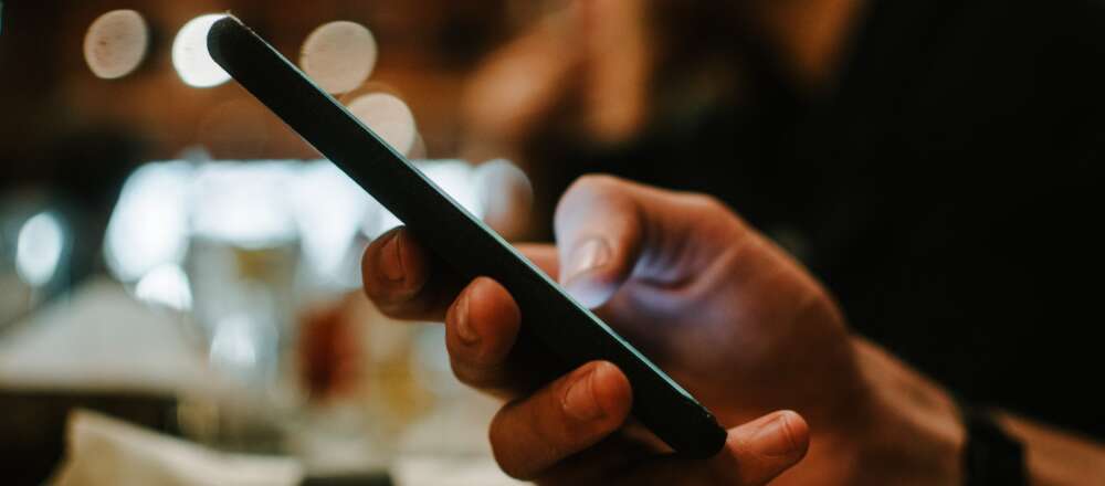 A person holding smartphone