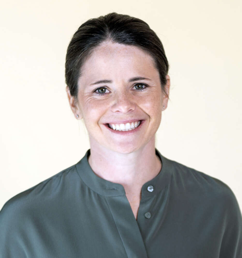 A headshot of a smiling Diana Matheson