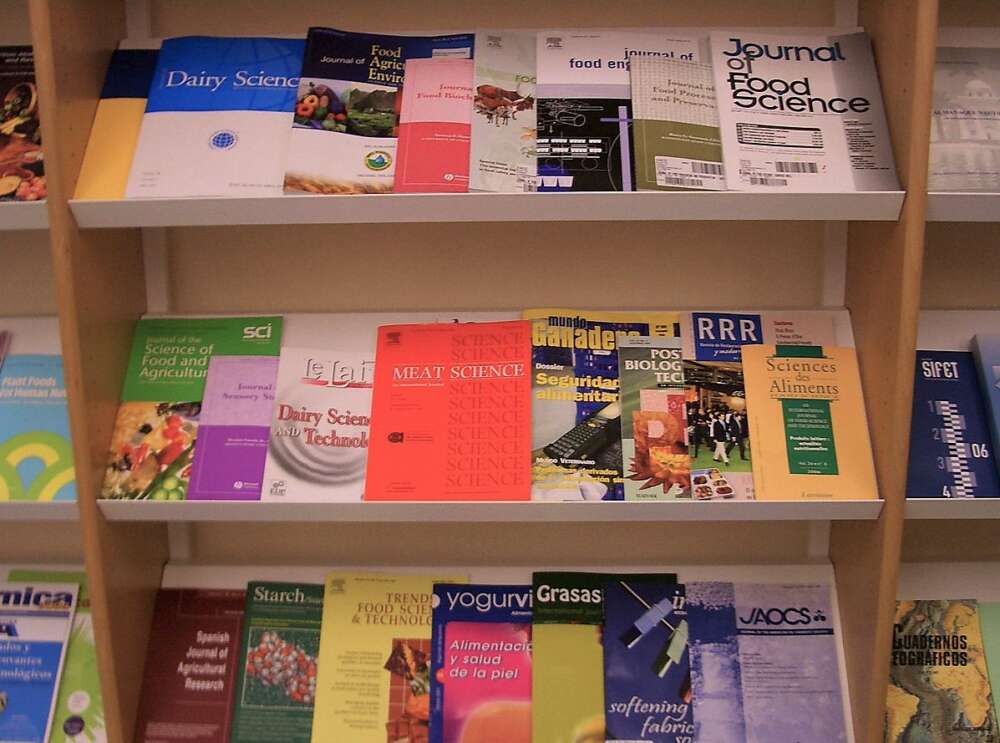 A variety of food science journals are displayed in a university library
