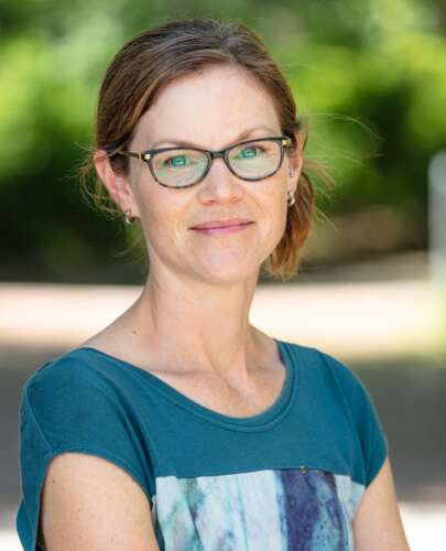 Dr. Sarah Alderman poses for a photo while standing outside