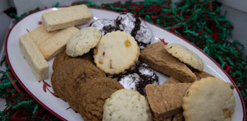 A plate displaying the holiday cookie box.