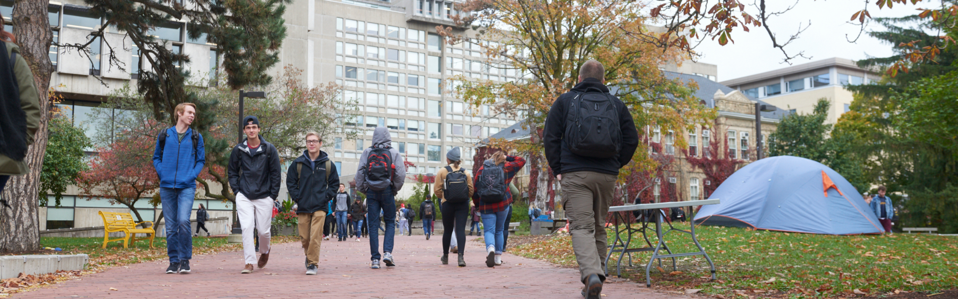 Students walk through Branion Plaza in the fall.