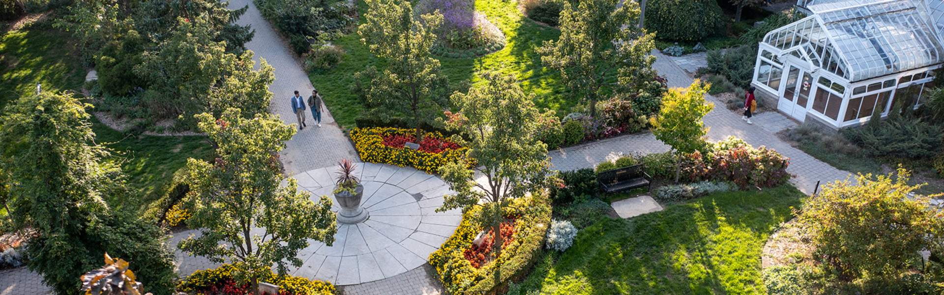 Aerial view of the conservatory and gardens on U of G campus in summer.