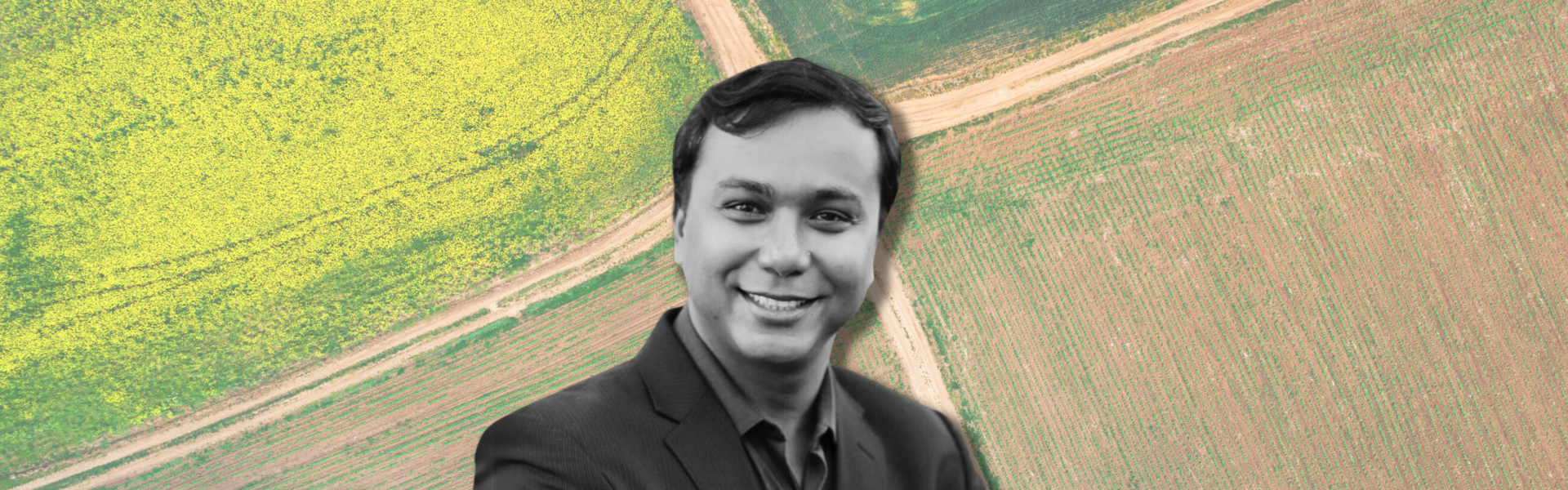 Dr. Asim Biswas pictured over a background of agricultural fields