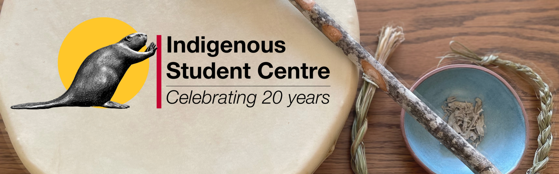 Indigenous student centre celebrating 20 years. Braided sweetgrass and some sage in a bowl.