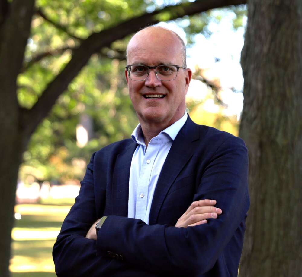 Dr. Michael von Massow poses for a portrait outside