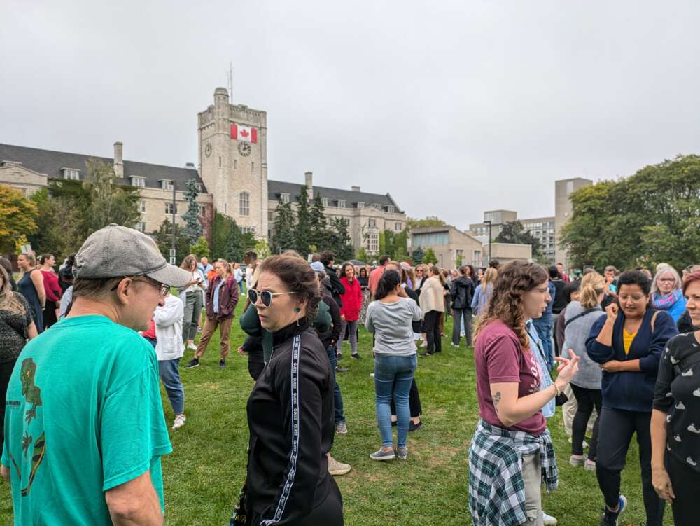 People socialize on Johnston green.