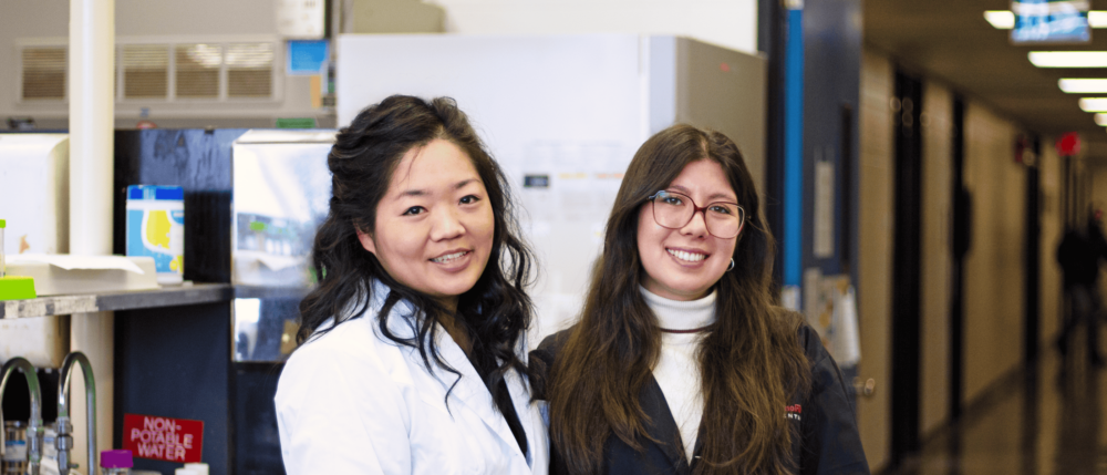 Dr. Clara Cho and Gia Shelp in a lab