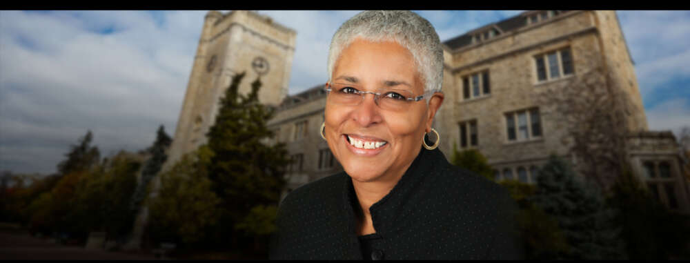portrait of Mary Anne Chambers with Johnston Hall in background