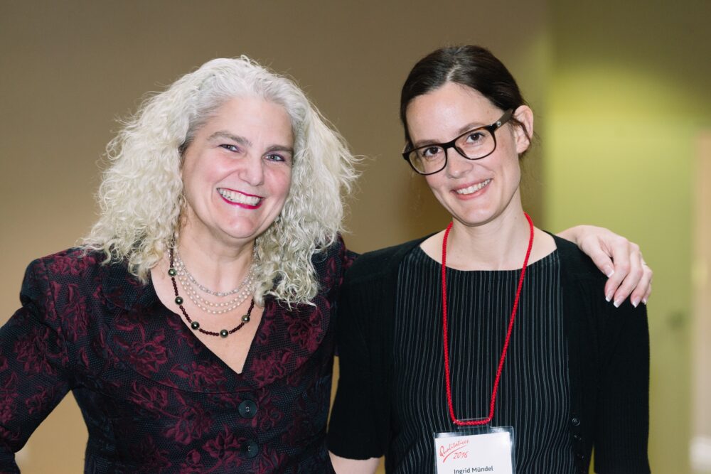 Drs. Carla Rice and Ingrid Mundel pose together for group photo