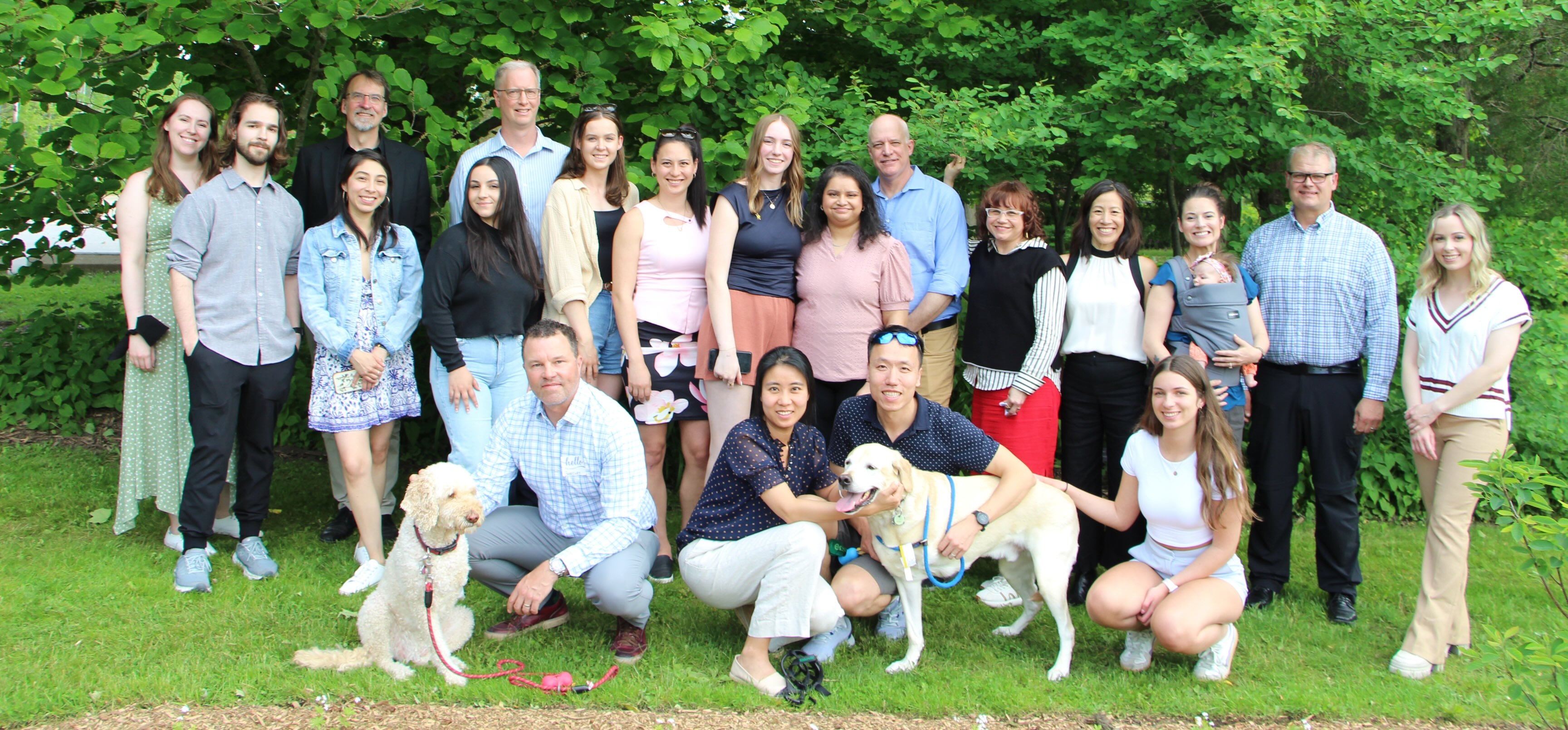 Group photos of DOGBONe event attendees, with pets
