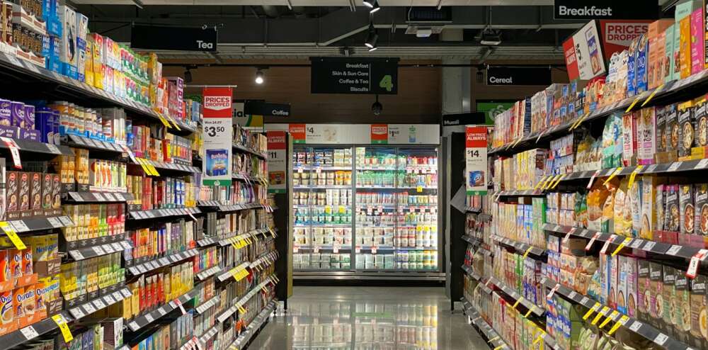 white and red labeled pack on white shelf