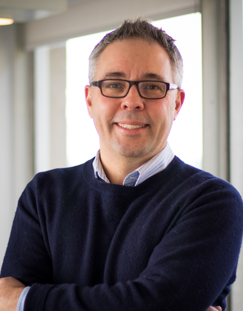 Dr. Craig Johnson smiles for a portrait