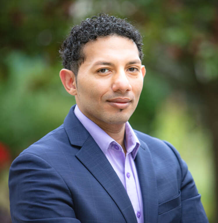 Dr. Basem Gohar poses for a portrait outside