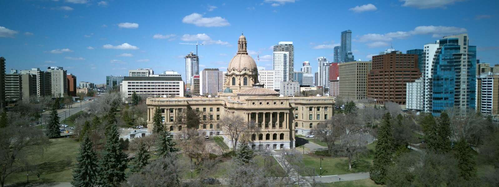 a view of a large building in the middle of a city